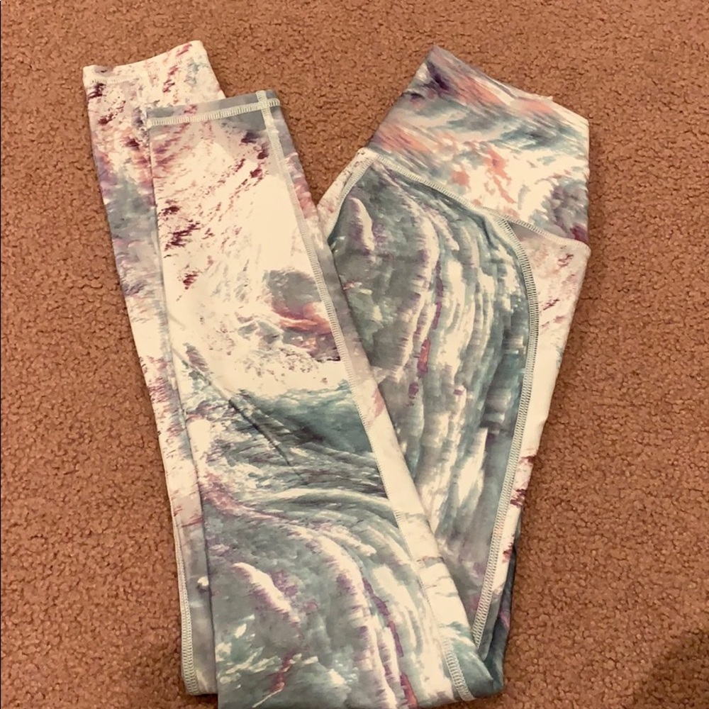 Grey, White, and Pink Fabletics leggings